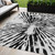5' X 8' Ivory Black And Gray Abstract Washable Indoor Outdoor Area Rug