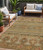 5' X 8' Beige Taupe And Gold Tribal Washable Indoor Outdoor Area Rug
