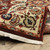 2' X 3' Red Ivory Orange And Blue Oriental Power Loom Stain Resistant Area Rug With Fringe