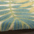 5' X 8' Green Yellow And Blue Palm Leaf Indoor Outdoor Area Rug