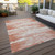 5' X 8' Coral And Ivory Striped Washable Indoor Outdoor Area Rug