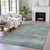 5' X 8' Aqua And Beige Abstract Washable Indoor Outdoor Area Rug