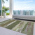 5' X 8' Olive Green Abstract Washable Indoor Outdoor Area Rug