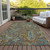 5' X 8' Brown Aqua and Gold Paisley Washable Non Skid Indoor Outdoor Area Rug