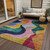 5' X 8' Green Orange And Pink Abstract Washable Indoor Outdoor Area Rug