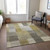 5' X 8' Brown Gold And Taupe Striped Washable Indoor Outdoor Area Rug