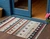 3' X 5' Beige Rust And Navy Blue Striped Washable Indoor Outdoor Area Rug