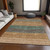 5' X 8' Terra Cotta Copper And Beige Striped Washable Indoor Outdoor Area Rug