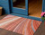 3' X 5' Terra Cotta Salmon And Orange Striped Washable Indoor Outdoor Area Rug