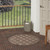 4' Dark Brown And Light Brown Round Geometric Indoor Outdoor Area Rug