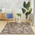 6' X 9' Brown And Ivory Floral Indoor Outdoor Area Rug