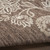 6' X 9' Brown And Ivory Floral Indoor Outdoor Area Rug
