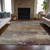5' X 8' Brown Gray And Purple Abstract Washable Indoor Outdoor Area Rug