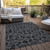 5' X 8' Black Charcoal And Ivory Geometric Washable Indoor Outdoor Area Rug