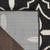 5' X 7' Black And Ivory Geometric Indoor Outdoor Area Rug