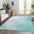5' X 8' Aqua Ivory And Teal Blue Abstract Washable Indoor Outdoor Area Rug