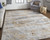 10' X 13' Tan Ivory And Blue Abstract Distressed Area Rug
