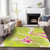 3' X 5' Lime Green Neon Pink And Ivory Abstract Washable Indoor Outdoor Area Rug