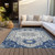 5' X 8' Navy Blue Ivory And Gray Oriental Washable Indoor Outdoor Area Rug
