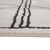 5' X 7' Ivory And Black Geometric Area Rug