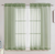 2 Piece Ivory Oval Solid Bordered Plush Bath Mat Set