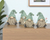 Set of Four Brown And Green Polyresin Gnomes