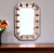 35" Rose Gold Glass Abstract Ornate Framed Accent Mirror