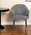Gray and Black Upholstered Fabric And Faux Leather Wing Back Dining Arm Chair