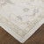 8' X 10' Tan Ivory And Orange Floral Hand Knotted Stain Resistant Area Rug