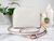 Michael Kors Jet Set X Cross Dome Vanilla/Powder Blush PVC Crossbody Bag - 194900701881