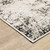 Homeroots Home Decor 10' X 13' Ivory Grey Black Beige And Tan Abstract Power Loom Stain Resistant Area Rug