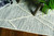 9' X 13' Ivory Grey Machine Woven Geometric Indoor Area Rug