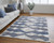 Homeroots Home Decor 10' x 14' Ivory Gray and Blue Chevron Power Loom Stain Resistant Area Rug