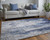 Homeroots Home Decor 12' X 15' Ivory Blue and Black Abstract Power Loom Distressed Area Rug