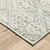 Homeroots Home Decor 6' x 9' Beige Brown Tan and Blue Green Abstract Power Loom Stain Resistant Area Rug