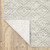 Homeroots Home Decor 6' x 9' Beige Brown Tan and Blue Green Abstract Power Loom Stain Resistant Area Rug