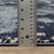 8' X 11' Blue Gray And Black Abstract Area Rug