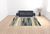 10' X 13' Blue Green Grey Light Blue And Beige Abstract Power Loom Stain Resistant Area Rug