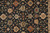 9' X 12' Black Gold And Gray Wool Floral Hand Knotted Stain Resistant Area Rug With Fringe
