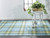 Homeroots Home Decor 5' x 8' Blue, Green and Black Abstract Hand Woven Stain Resistant Area Rug