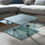 32" Clear and Silver Glass and Metal Coffee Table With Three Shelves
