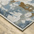 Homeroots Home Decor 6' x 9' Abstract Power Loom Stain Resistant Area Rug, Grey Blue Navy Ivory and Brown