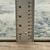 7' X 9' Beige And Ivory Abstract Area Rug