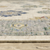 5' X 8' Ivory And Blue Oriental Area Rug With Fringe