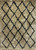 Homeroots Home Decor 5' x 7' Cream and Black Lattice Area Rug