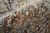 Homeroots Home Decor 8' x 10' Tan Orange and Blue Floral Power Loom Distressed Area Rug with Fringe