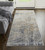 8' Ivory Gray And Tan Abstract Distressed Runner Rug Polyester
