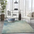 5' X 7' Blue And Ivory Abstract Area Rug