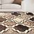 3' X 5' Ivory Brown And Black Quatrefoil Distressed Area Rug