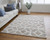 4' X 6' Tan Taupe And Ivory Geometric Power Loom Stain Resistant Area Rug